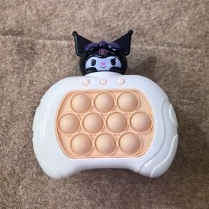 hello kitty sanrio quick push pop it toy